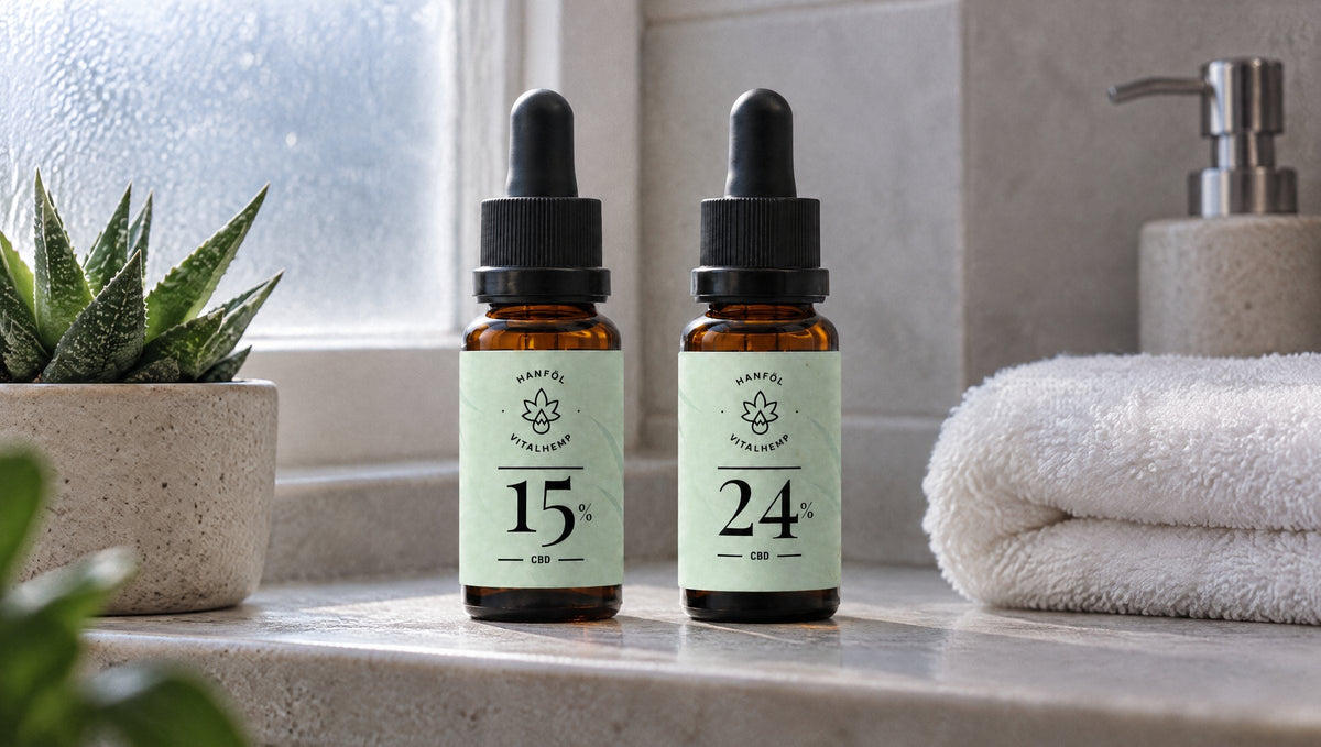 Zwei Flaschen VITALHemp Pure CBD-Öl, 15 % und 24 %, auf einem Badezimmerregal am Morgen.