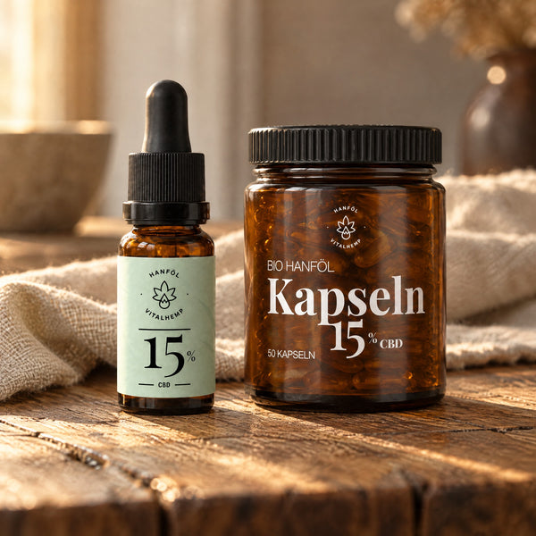 Zuhause-&-unterwegs-Set: CBD-Öl 15 % mit mintgrünem Etikett und Braunglas-Dose CBD-Kapseln 15 % auf Eichenholz